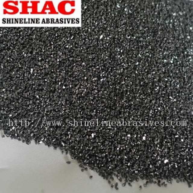 Black silicon carbide powder and grains